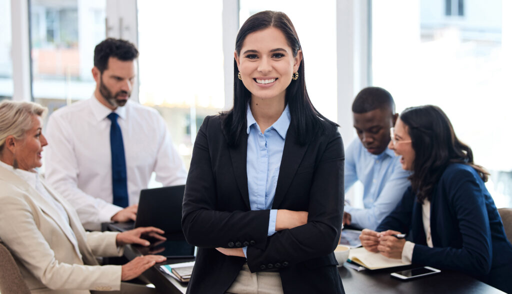 A smiling business professional thriving in a dynamic full-time job workplace.